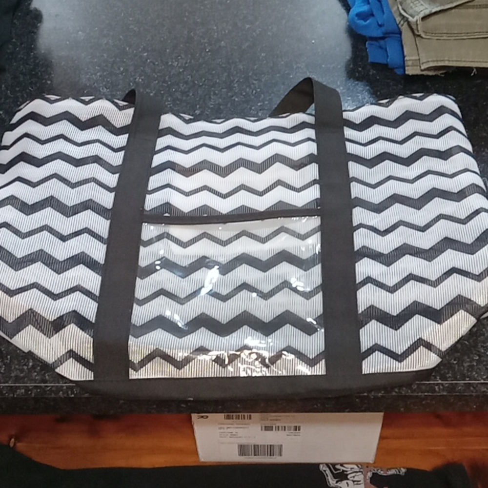 Swim bag with velcro enclosure